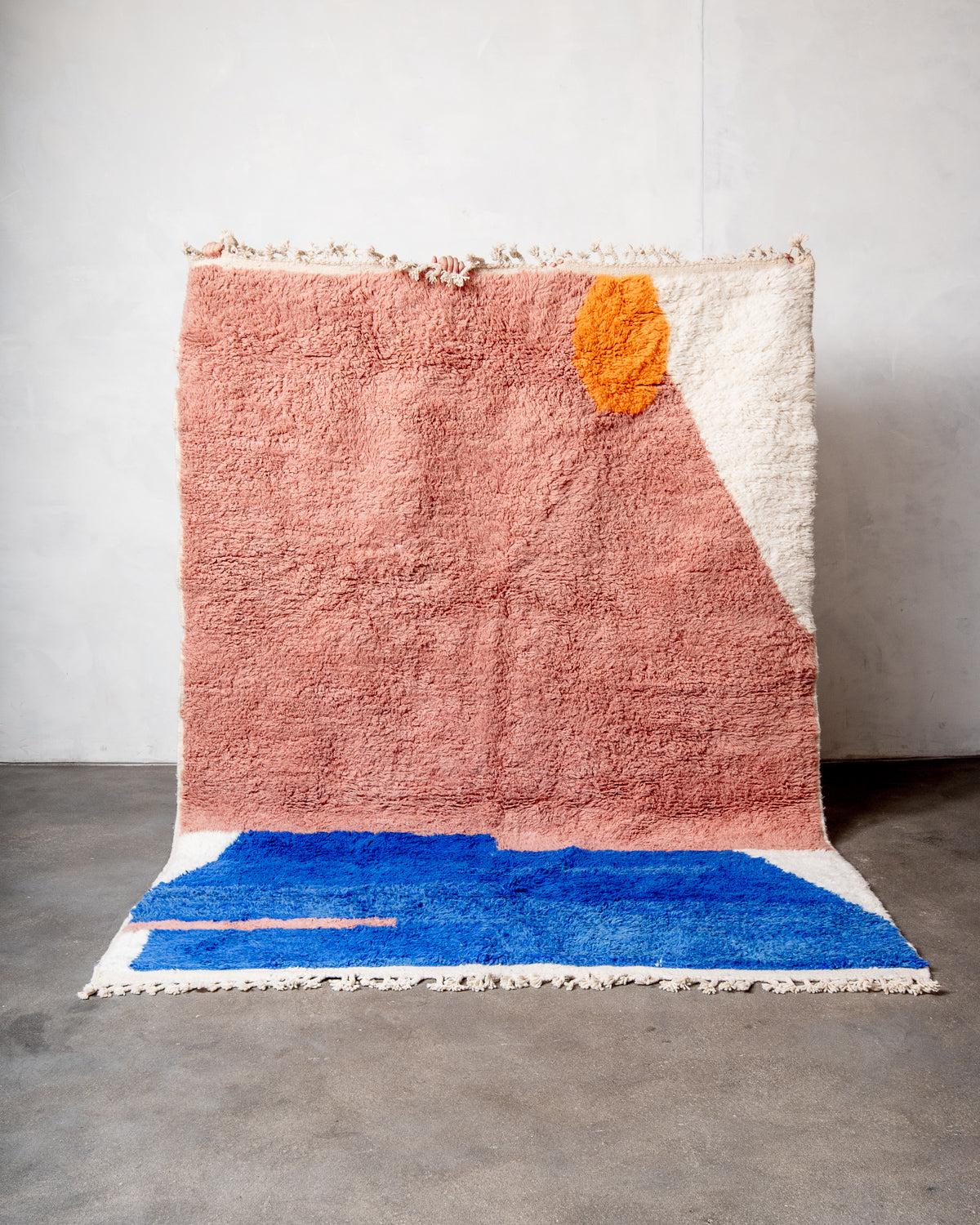 Modern, designer, handcrafted Berber rug from Morocco. Beniourain carpet with beautiful colours and patterns and fluffy wool texture.
